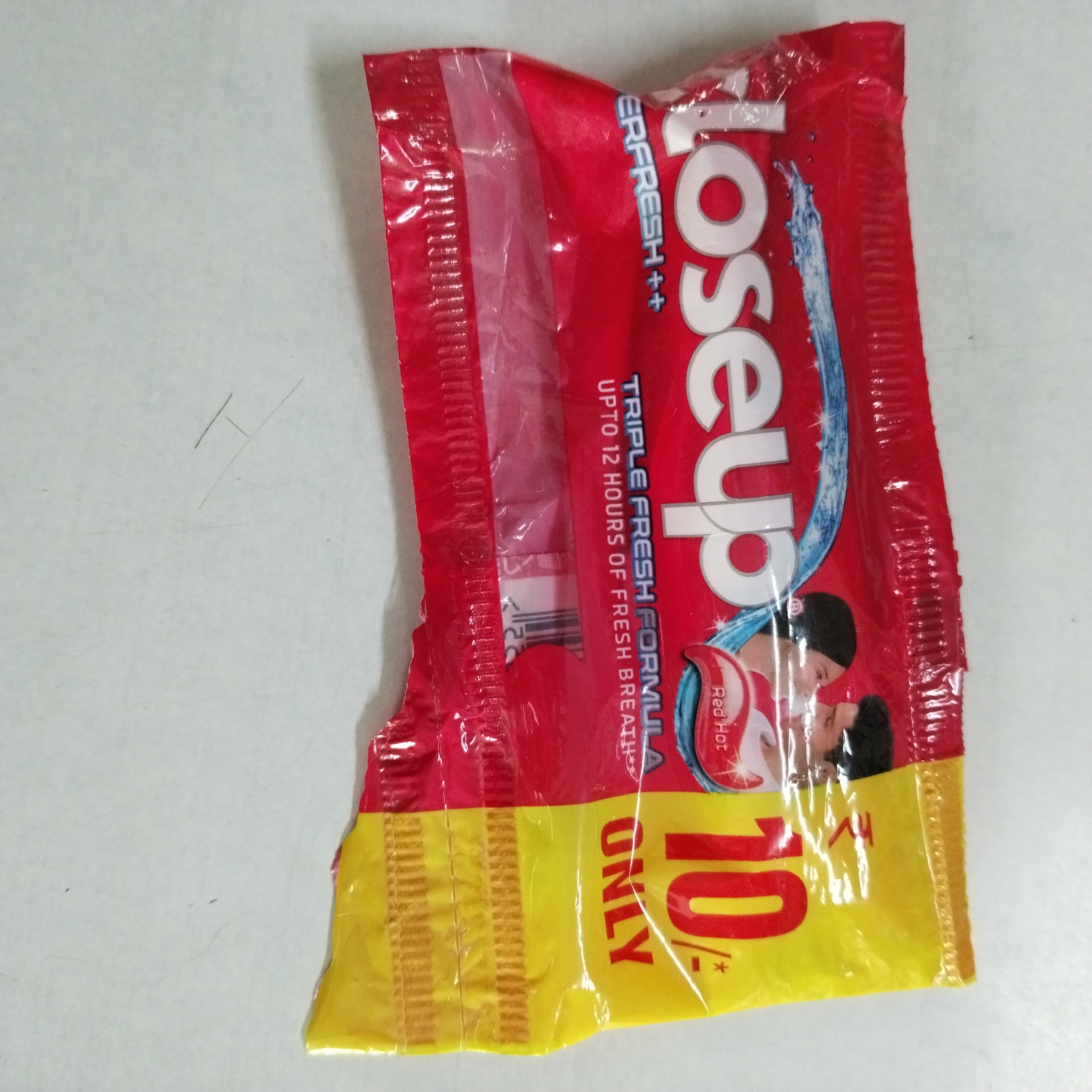 Closeup triple fresh toothpaste