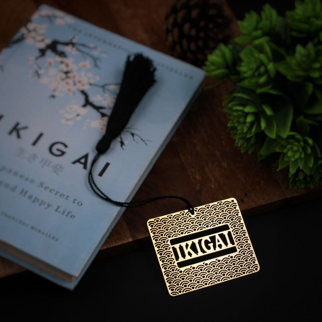 ikigai-inspired-brass-metal-bookmark-with-simple-black-tassel,-unique-japanese-design-for-mindful-reading-for-book-lovers-and-gifting.1