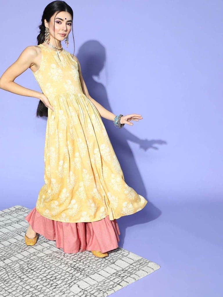 women-yellow-white-floral-printed-keyhole-neck-cotton-kurta-vck85151